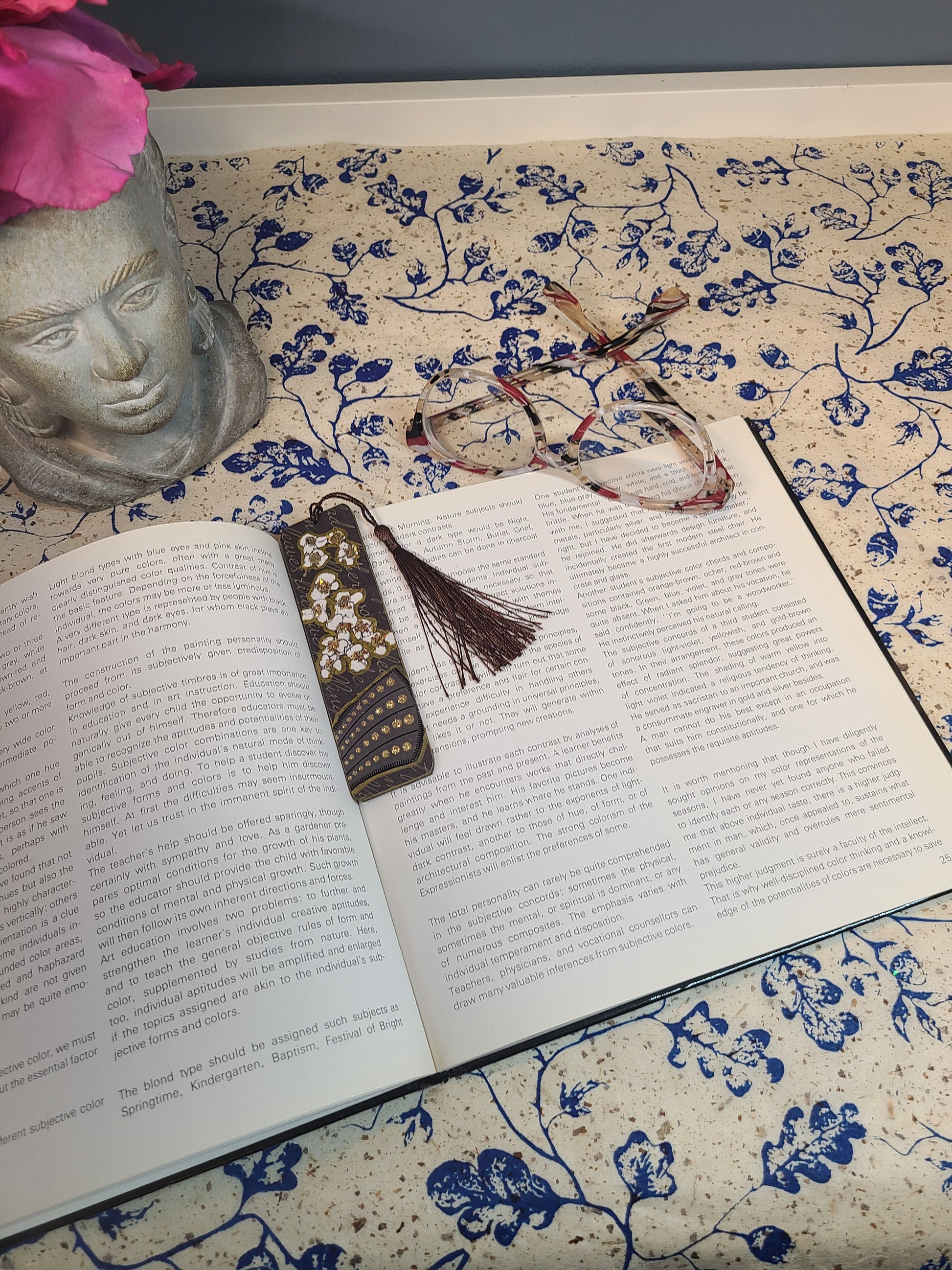 bookmark with tassel on open book